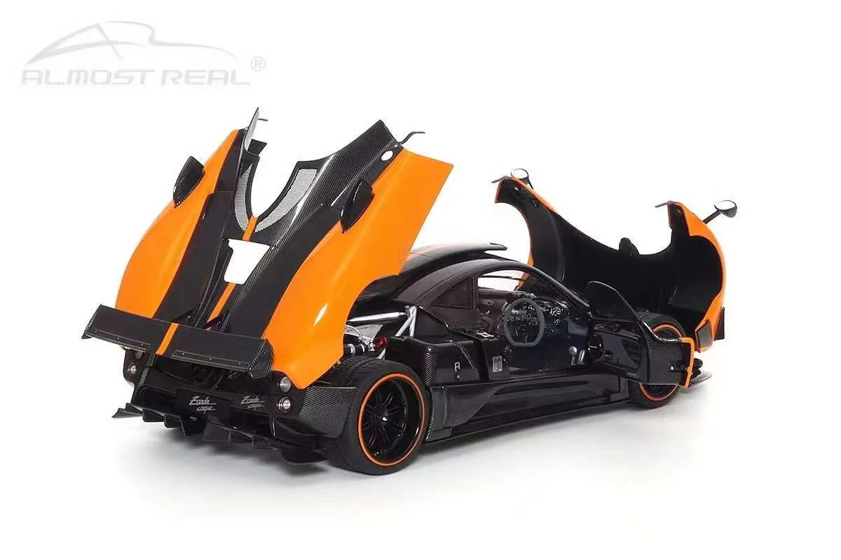 Almost-Real 2009 Pagani Zonda Cinque Coupe Orange & Carbon 1:18 - Image 5
