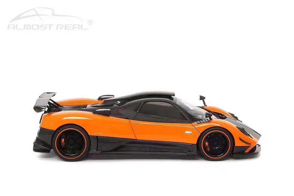 Almost-Real 2009 Pagani Zonda Cinque Coupe Orange & Carbon 1:18 - Image 6