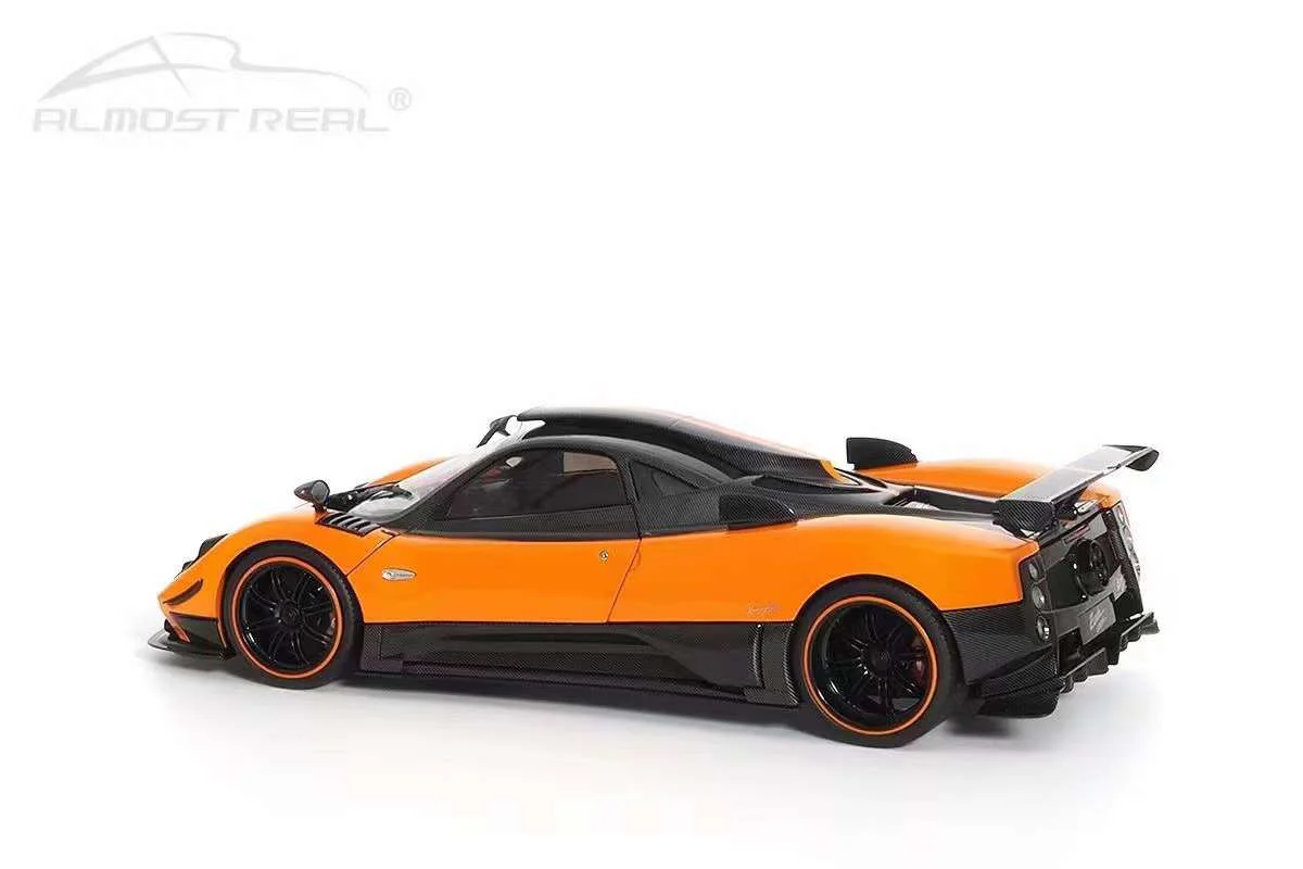 Almost-Real 2009 Pagani Zonda Cinque Coupe Orange & Carbon 1:18 - Image 8