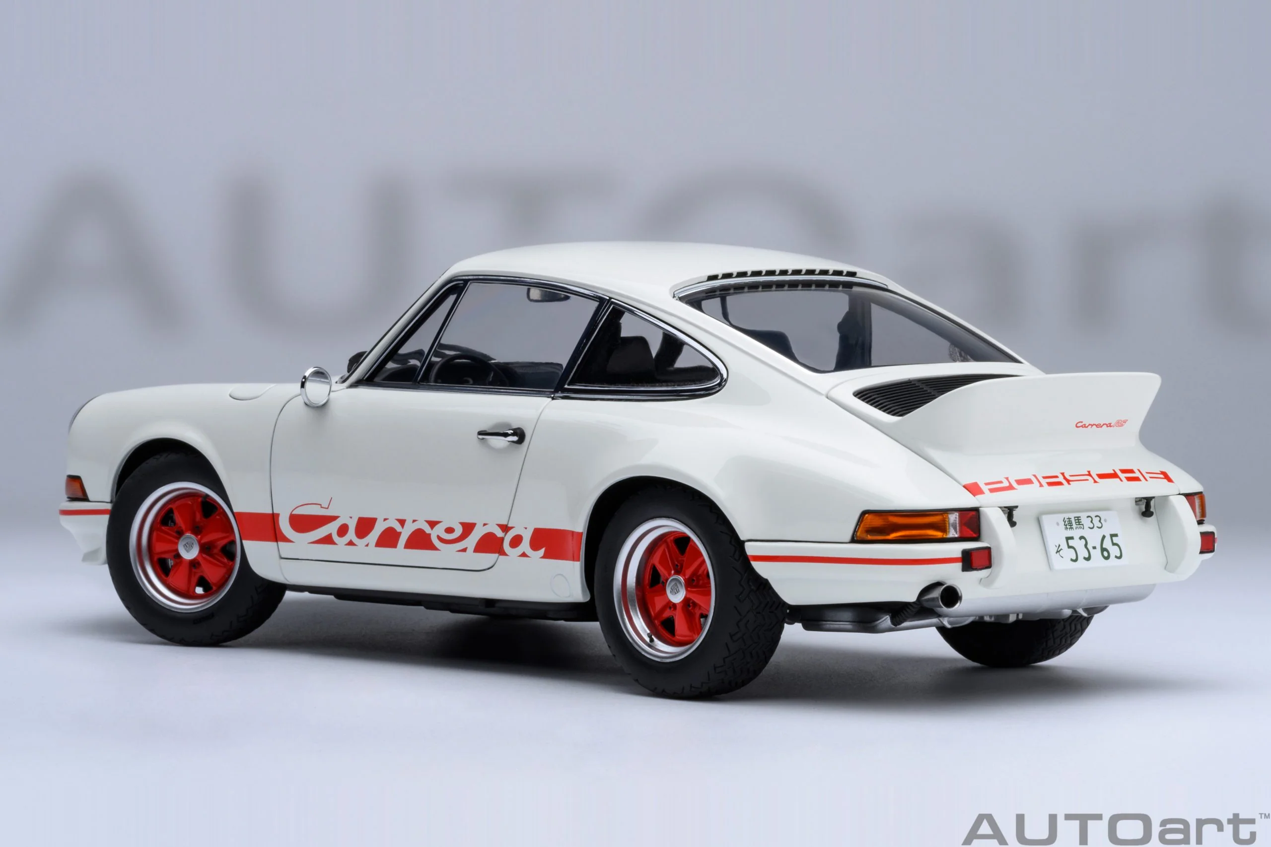 AUTOart Porsche 911 Carrera 2.7 RS Grand Prix White w/ Red "The Circuit Wolf" 1:18 - Image 2