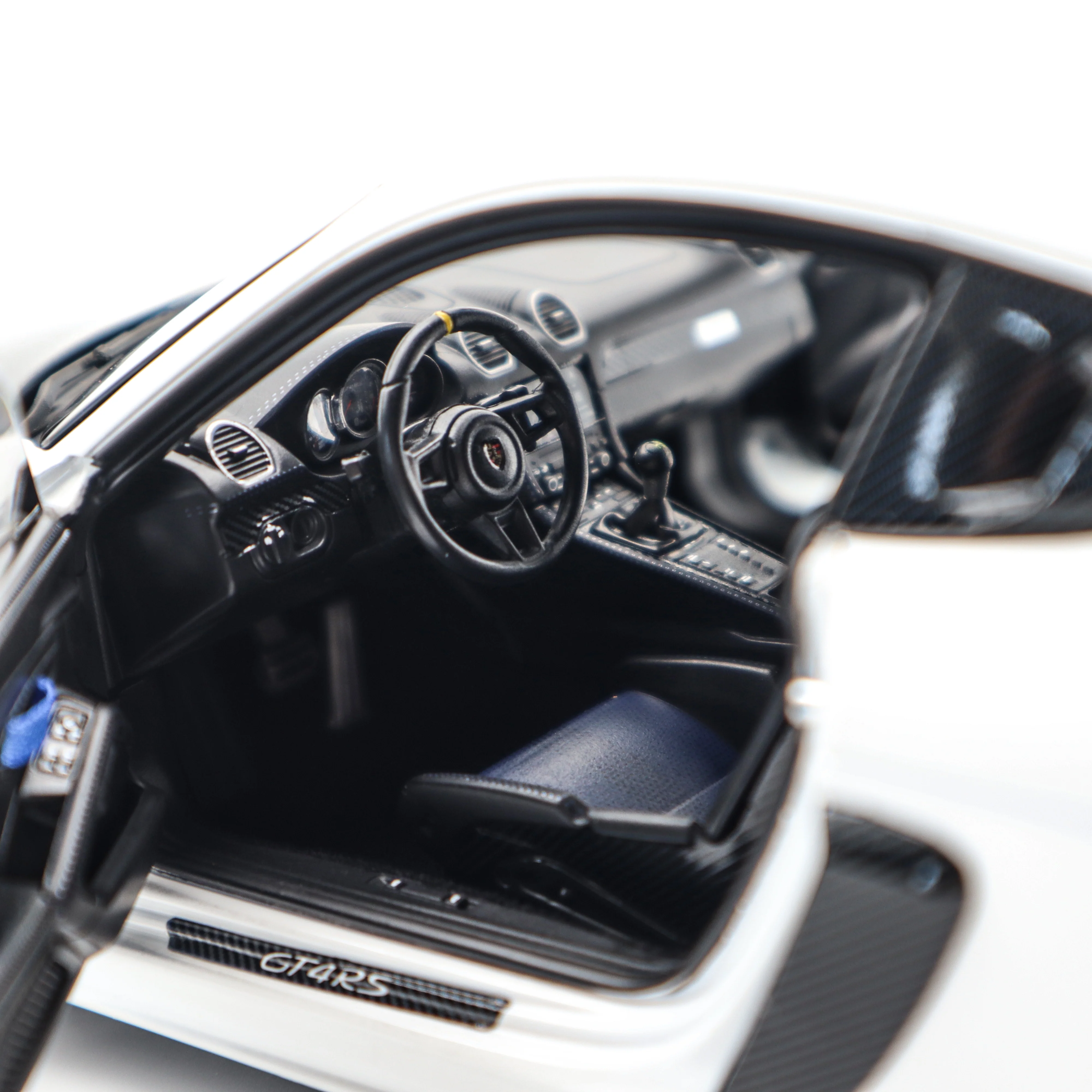 Norev 2023 Porsche 718 Cayman GT4 RS w/ Weissach Package White w/ Blue Wheels 1:18 - Image 14